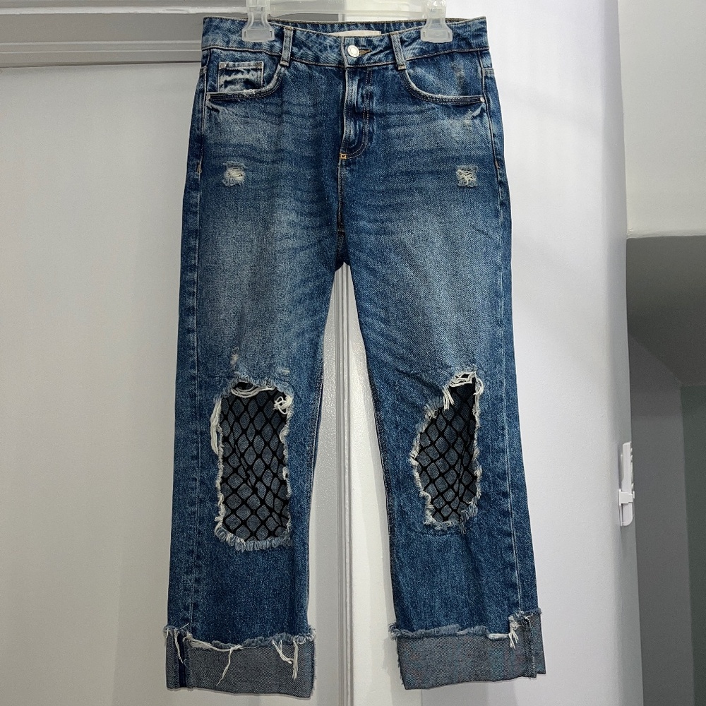 Zara  (4/36) distressed, cropped jeans with fishnet inserts (S).